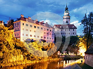 Cesky Krumlov with castle, old town and church at dramatic mist, Czech Republic