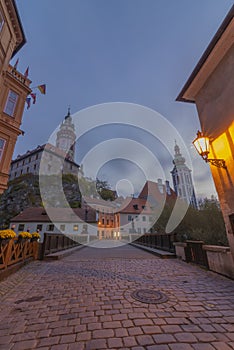 Cesky Krumlov old town with Vltava river and bridges in autumn color morning