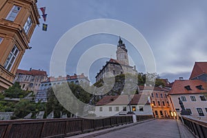 Cesky Krumlov old town with Vltava river and bridges in autumn color morning