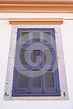 Cesme Alacati located in old antique house blue wooden windows and shutters, Turkey Izmir