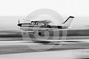 Cessna 210 - Touch 'n Go - BW photo