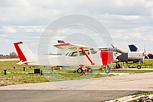 The cessna plane is on the runway