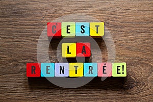 Cest la rentree - back to school in french, word concept on building blocks, text