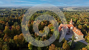 Cesvaine Medieval Castle in Latvia  From Above Top View. A Manor House of the Late 19th Century, a Building of Stones With a Brown