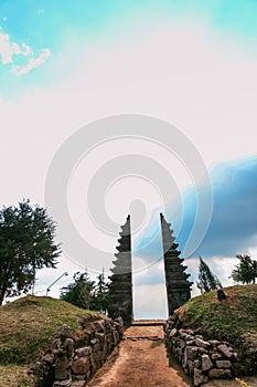 First Gate Inside Cetho Temple In The Morning Cloudy Sky at Karanganyar Tawangmangu Central Java Indonesia photo