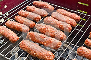 Cevapi on the BBQ photo