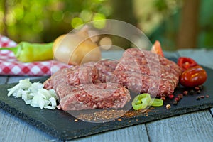 Cevapi - minced meat with spices ready for the grill