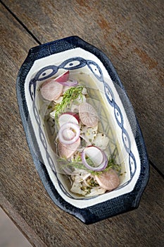 Ceviche marinated fish salad with vegetables