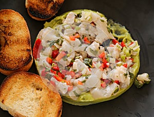 Ceviche served with toasts