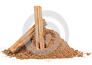 Ceylon cinnamon sticks with powder isolated on white background