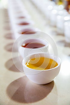 Ceylon tea degustation cups closeup view photo