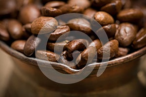 Cezve with freshly roasted coffee beans