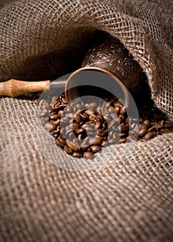 Cezve with freshly roasted coffee beans