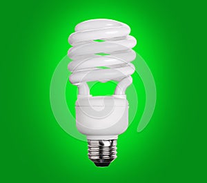 CFL Fluorescent Light Bulb on green