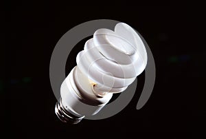 Cfl lightbulb light on black