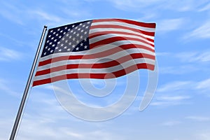 CGI isolated USA flag waving on a blue sly - close up of United States of America national flag flowing in the wind in US American