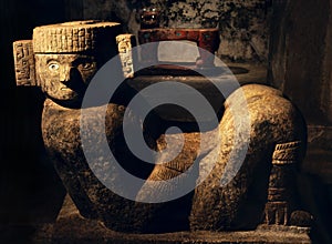 Chac Mool and the red tiger sculpture in Kukulkan pyramid photo