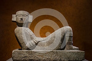 Ancient sculpture of a Chac Mool photo
