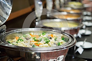 Chafing dishes on the table at  the luxury banquet