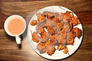 Chai with pakoras and bhajiyas