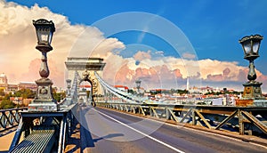 Chain bridge. Dramatic sunset. Royal palace. Budapest, Hungary.