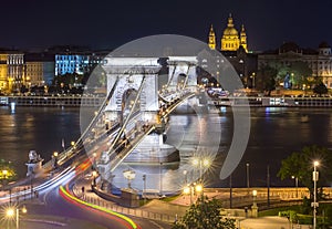 Chain Bridge over Danube river and St. Stephen`s Basilica at night, Budapest, Hungary