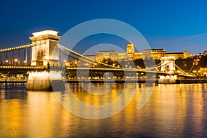 Chain bridge over Danube river at sunset in Budapest, Hungary