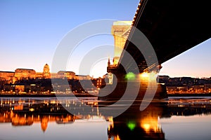 The Chain Bridge at sunset over the icy Danube River, Budapest,