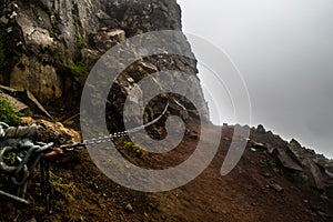 Chain hand rail marking the path at the top of Mount Esja