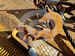 Chain hook of the tower crane for lifting cargo close-up. Rope slings close-up