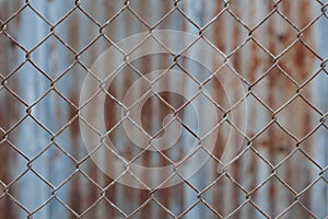 Chain link fence,Rusty wire fence