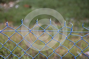 chain link fencing with blurred background on August 28,2022 at Terengganu, Malaysia