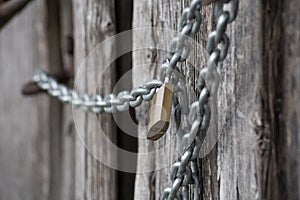chain lock on wooden wall