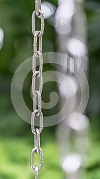 Chain made of metal steel iron link for connection and linkage concept photo