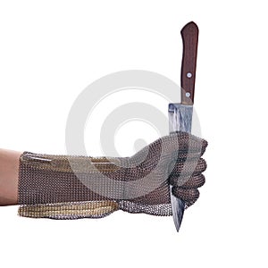 chain mail armor glove. person holds a kitchen knife by the blade. isolated on a white background