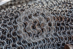 Chain-mail or Hauberk texture, metal protective armour of medieval or middle ages times, close up macro