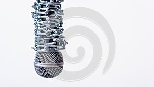 Chain on microphone with copy space on white background