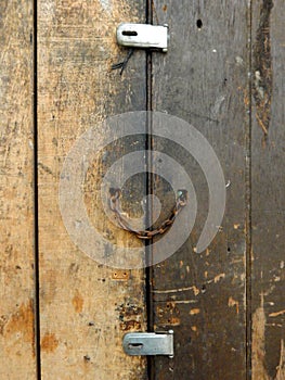 chain on an old wooden door