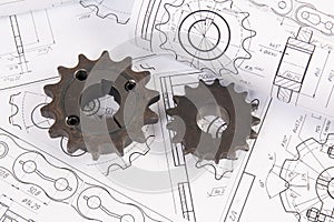 Chain sprockets on a paper engineering drawings