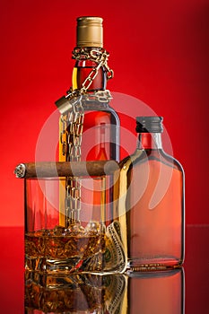 Chain and whisky bottles