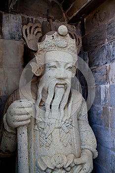 Chaina sculpture at wat arun, bangkok, thailand