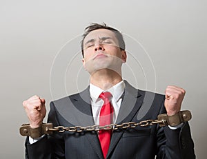 Chained businessman