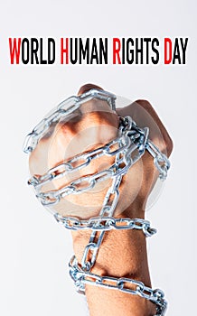 Chained fist hands with WORLD HUMAN RIGHTS DAY text