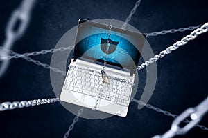 Chained laptop with shield symbol.