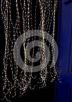 chains of light on a dark blue background resemble a starry sky at night.