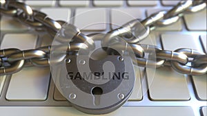 Chains and lock with GAMBLING text on the computer keyboard. Conceptual 3D rendering