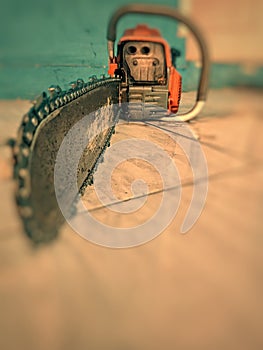 chainsaw to cut down trees in the forest