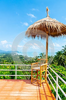 chair on balcony with ocean sea viewpoint background in Thailand
