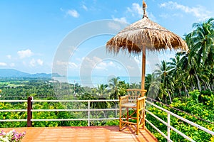 Chair on balcony with ocean sea viewpoint background in Thailand