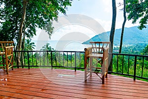 chair on balcony with ocean sea viewpoint background in Thailand